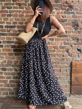 Robe à pois noire