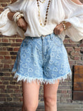 Short vaquero azul con corazón efecto desgastado