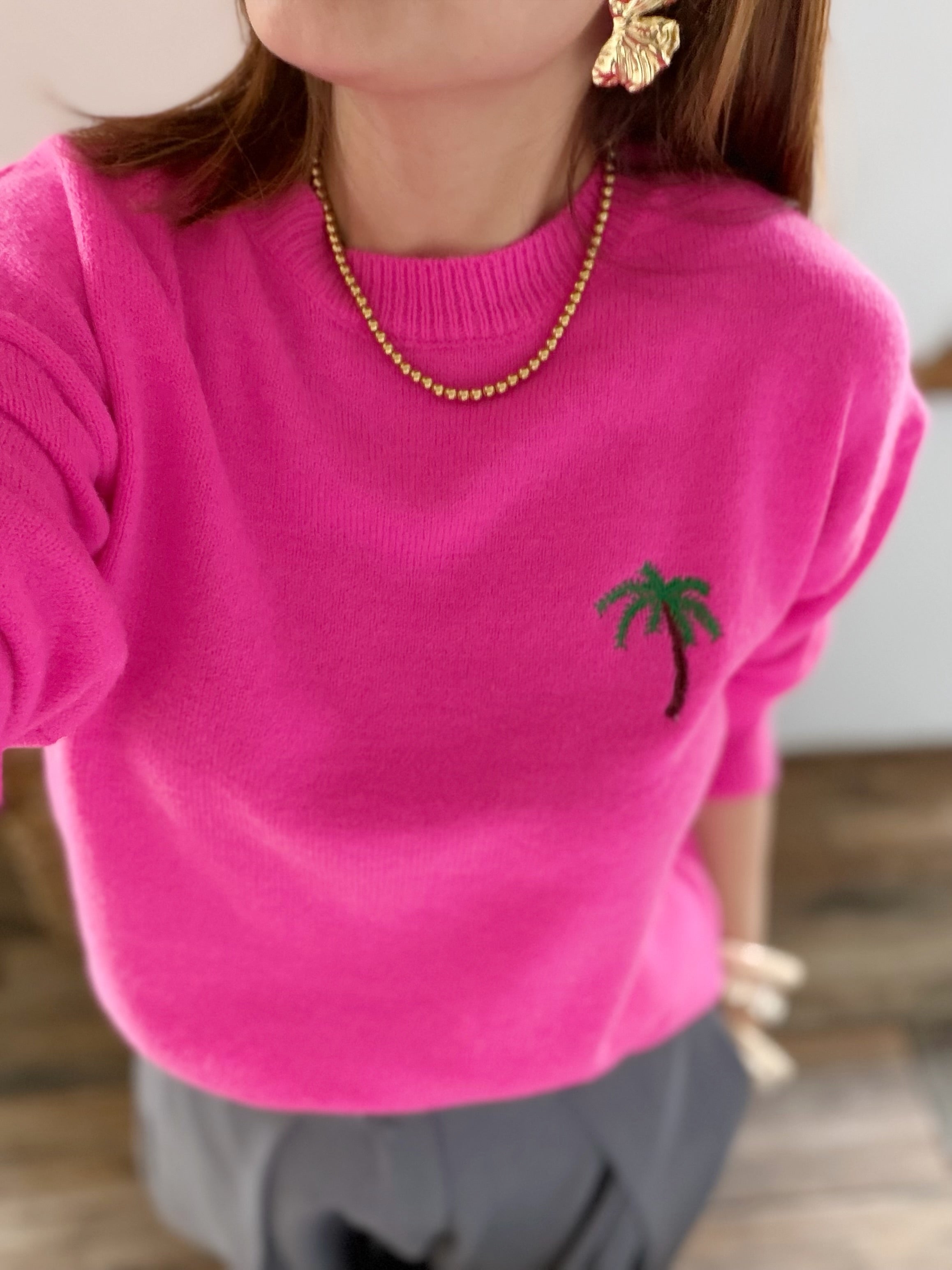 Pull fuschia palmier