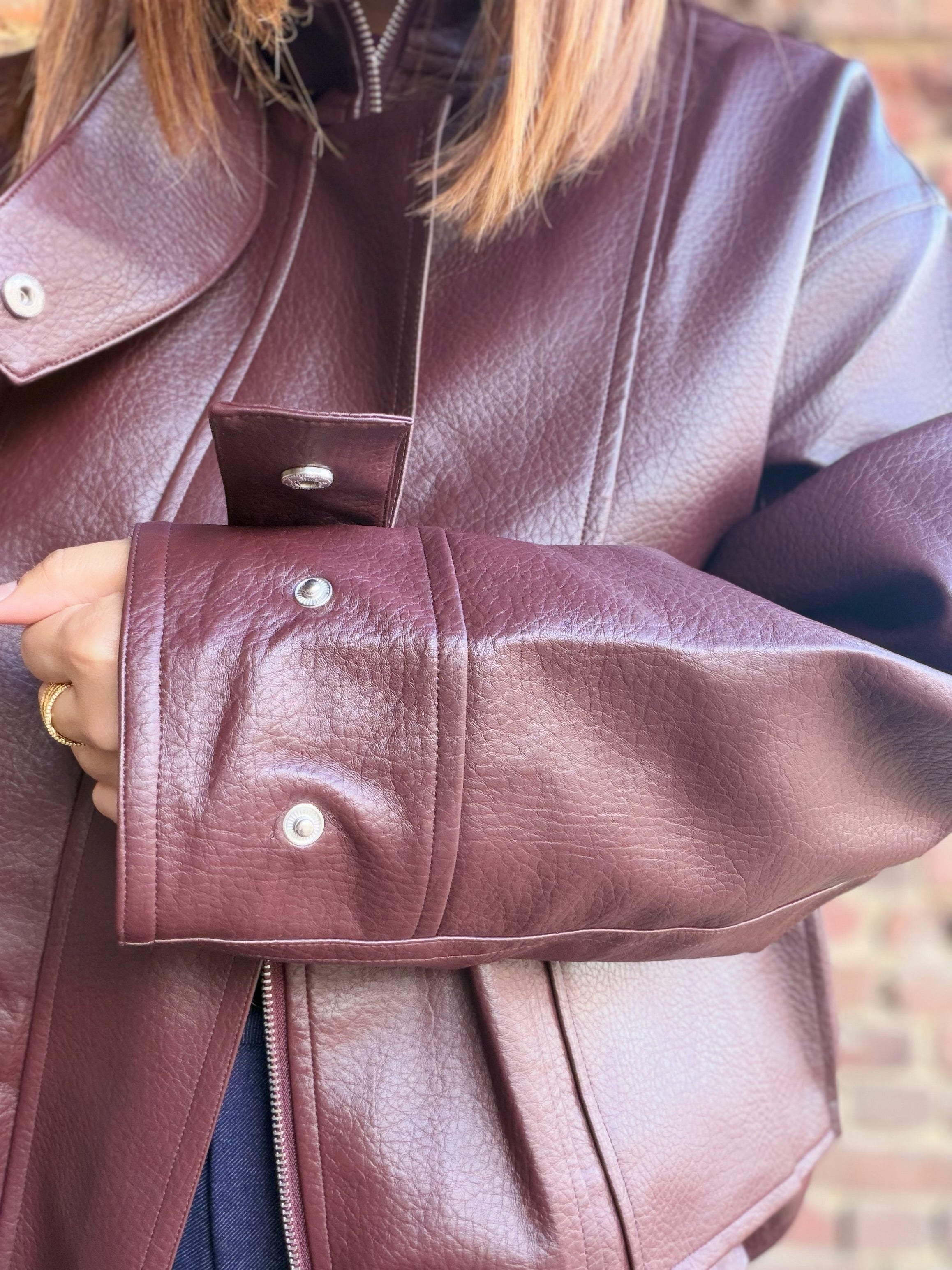 Veste bordeaux en similicuir col montant
