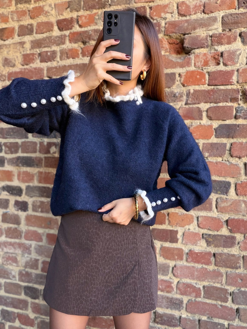 Pull  bleu marine avec col en vague