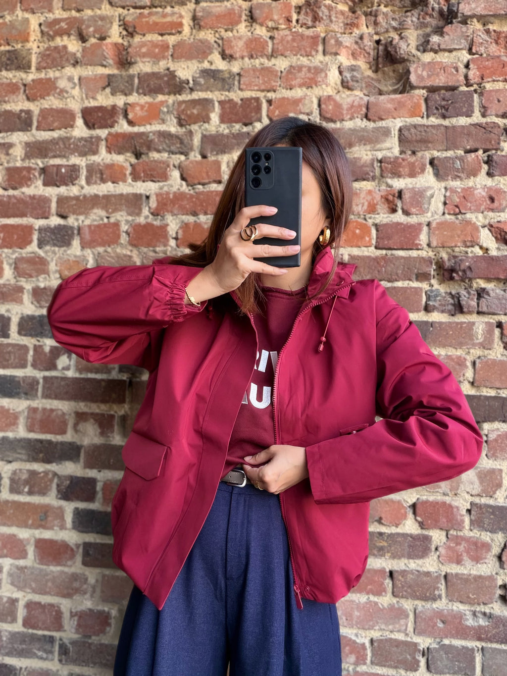 Blouson imperméable rouge bordeaux
