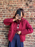 Blouson imperméable rouge bordeaux