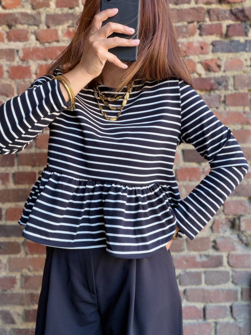 Blouse noire  rayé péplum