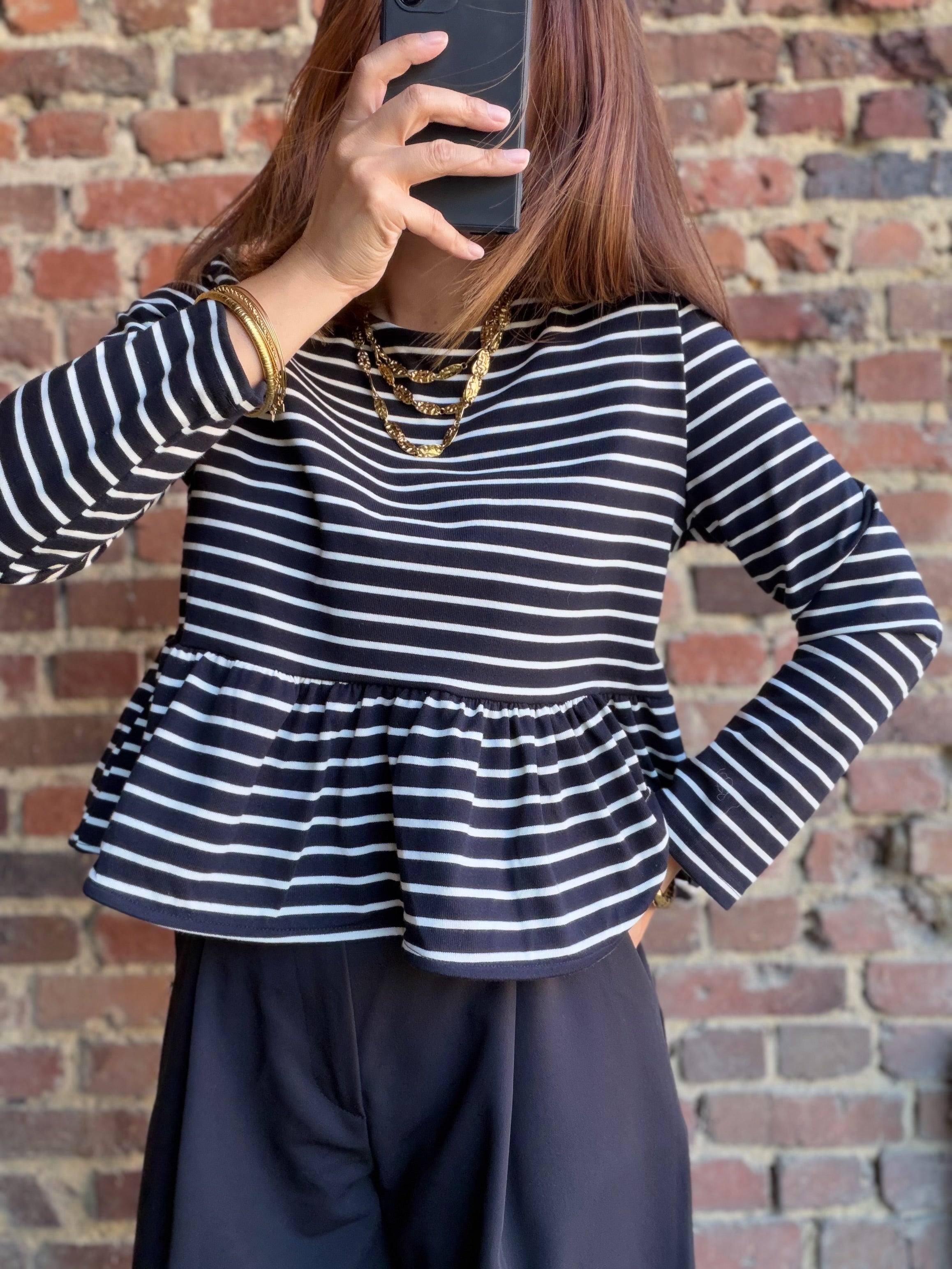 Blouse noire  rayé péplum