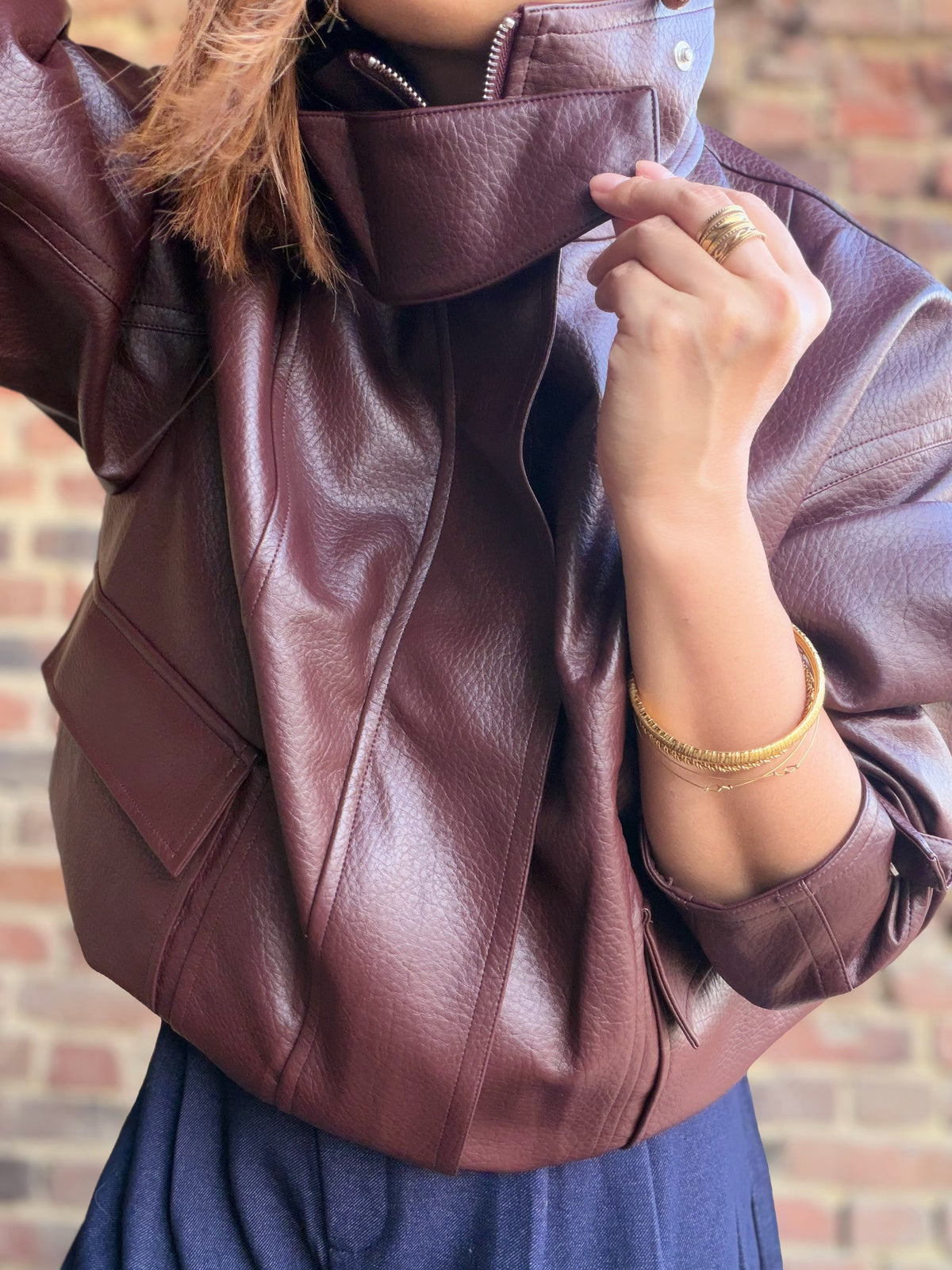 Veste bordeaux en similicuir col montant