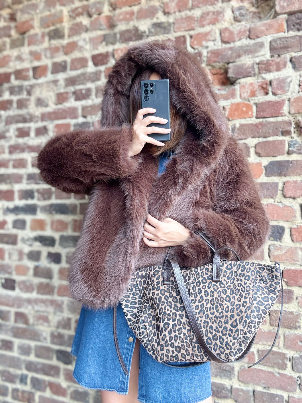 Veste en fourrure avec capuche