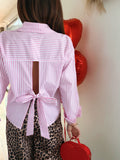 Chemisier rose à nouer dans le dos