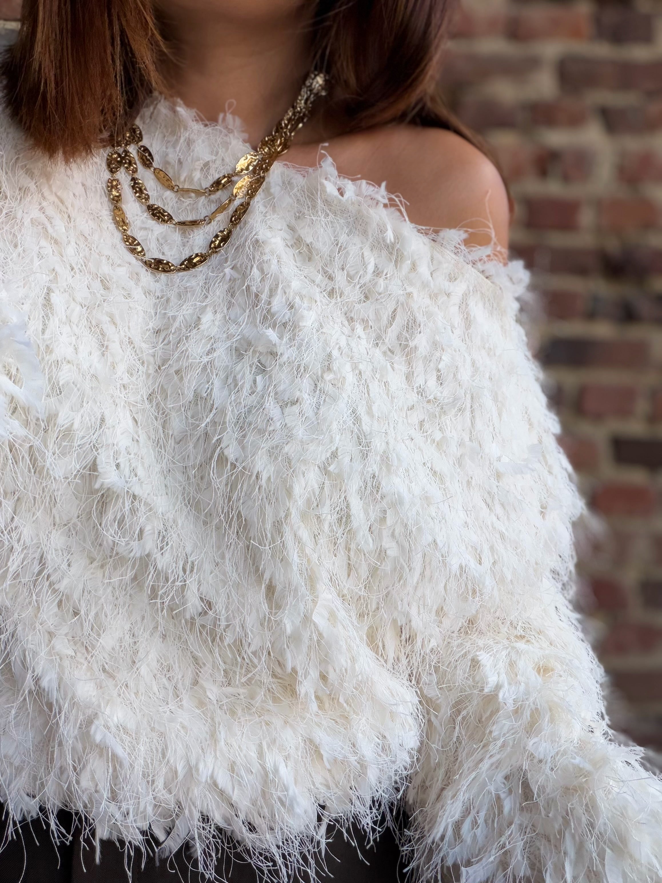 Pull plume écru