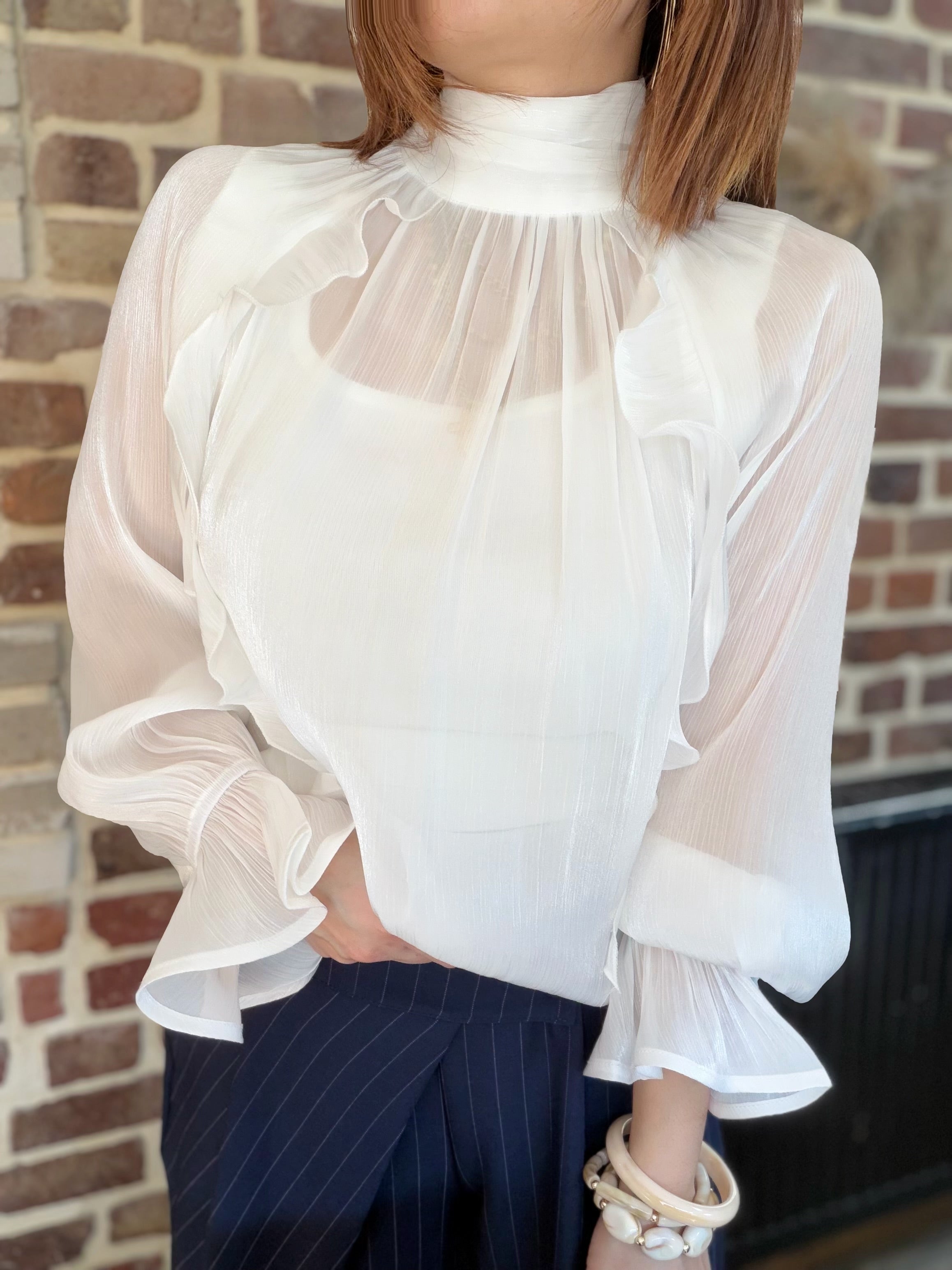 Blouse transparente brillante