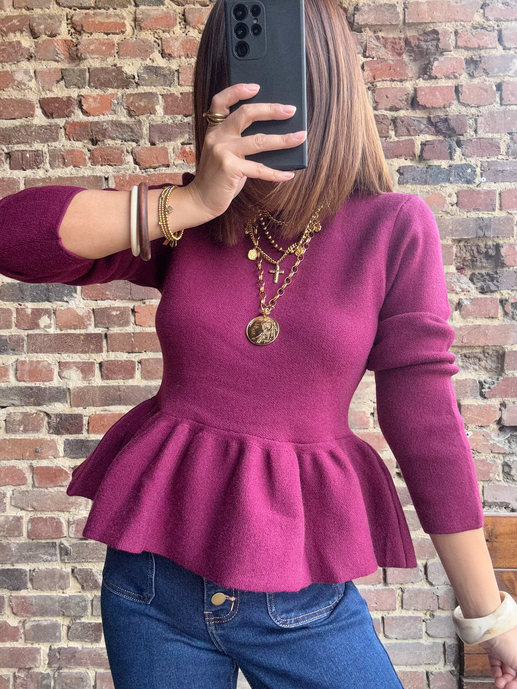 Pull bordeaux péplum