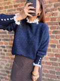 Pull  bleu marine avec col en vague