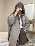 Manteau avec écharpe en laine oversize