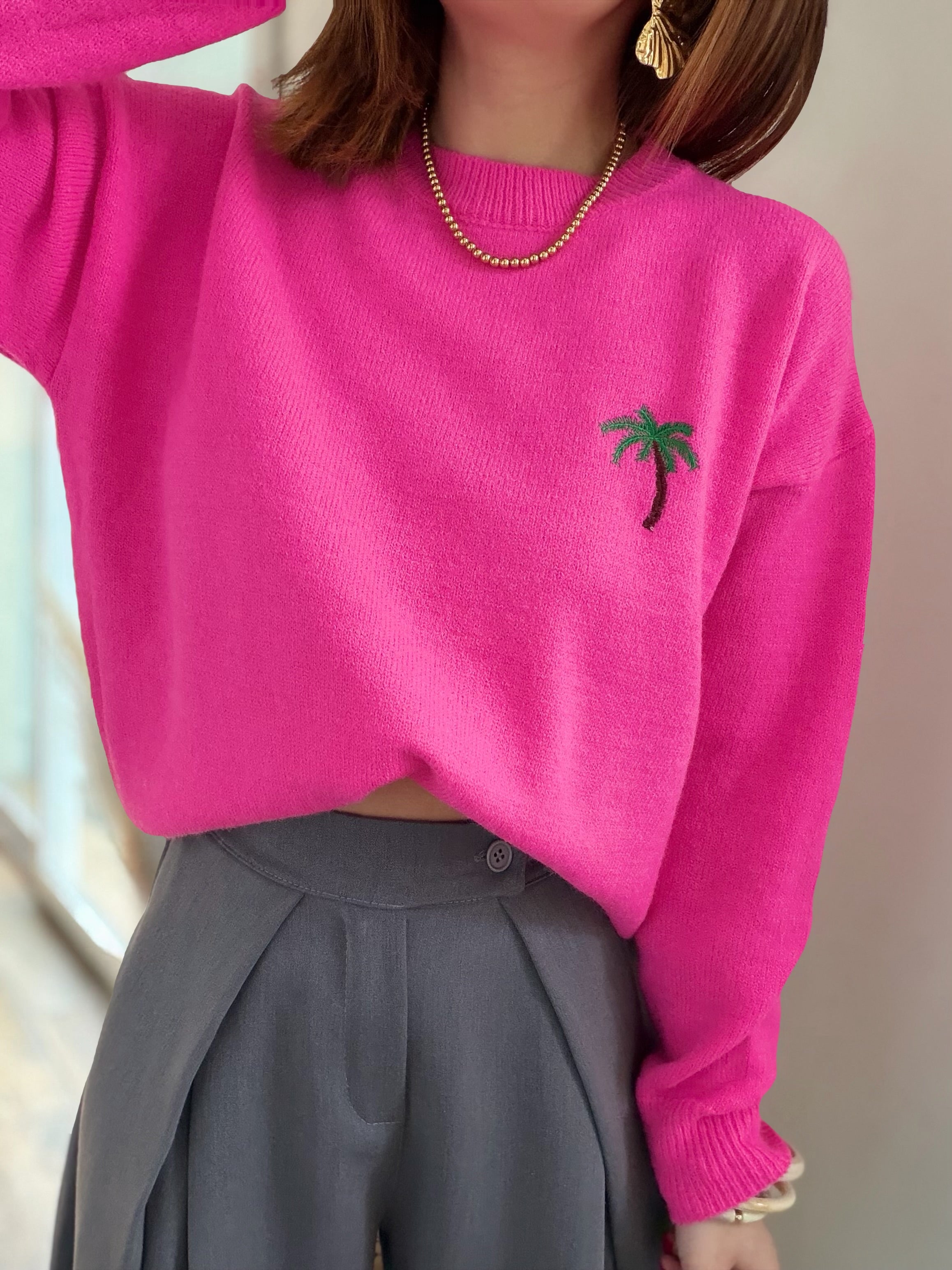 Pull fuschia palmier