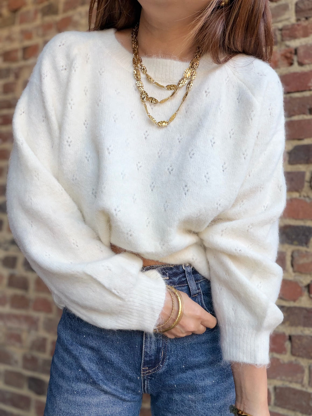 Pull écru avec dos ouvert
