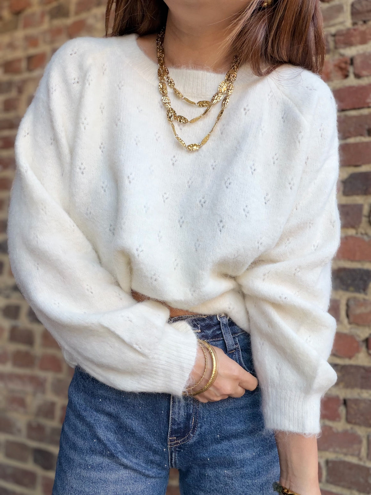 Pull écru avec dos ouvert