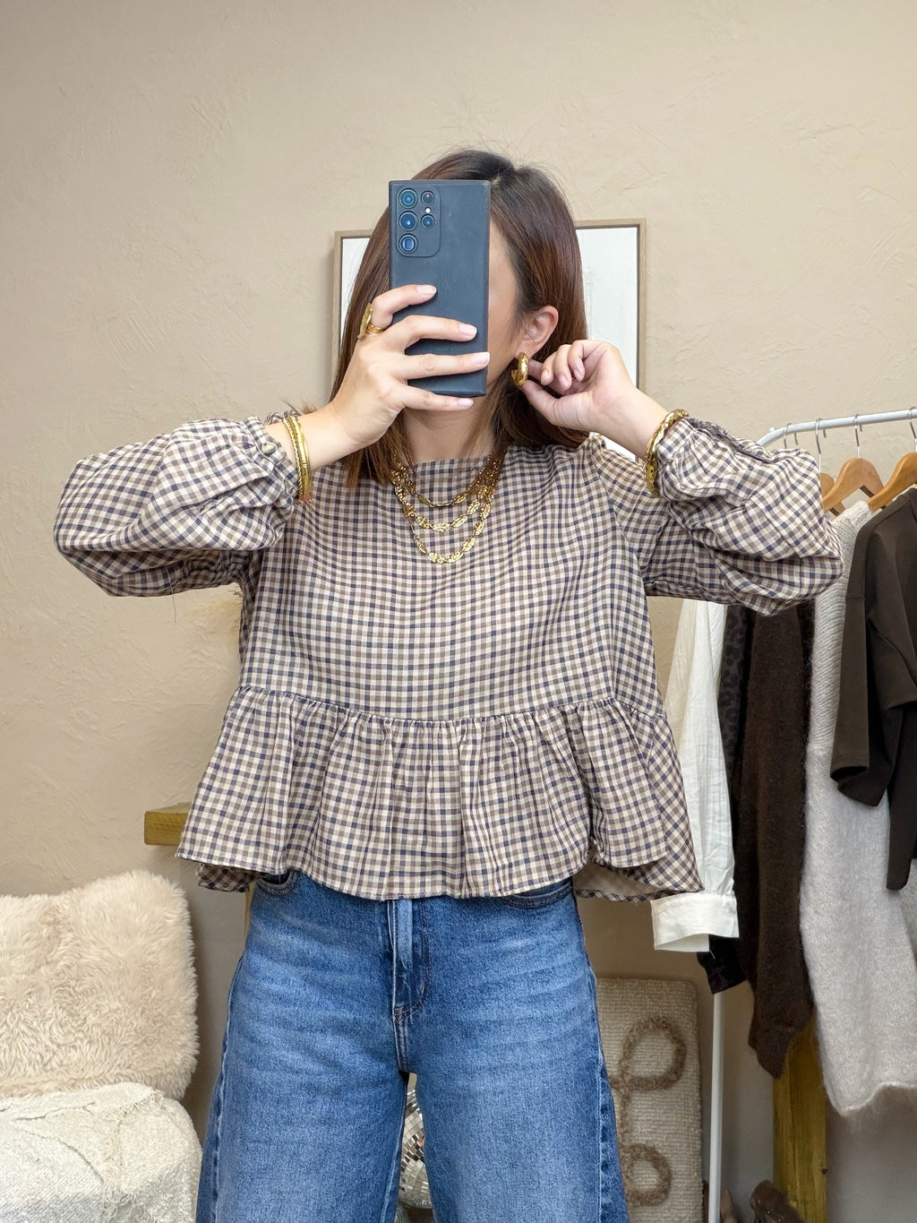 Blouse à carreaux avec ouverture dans le dos