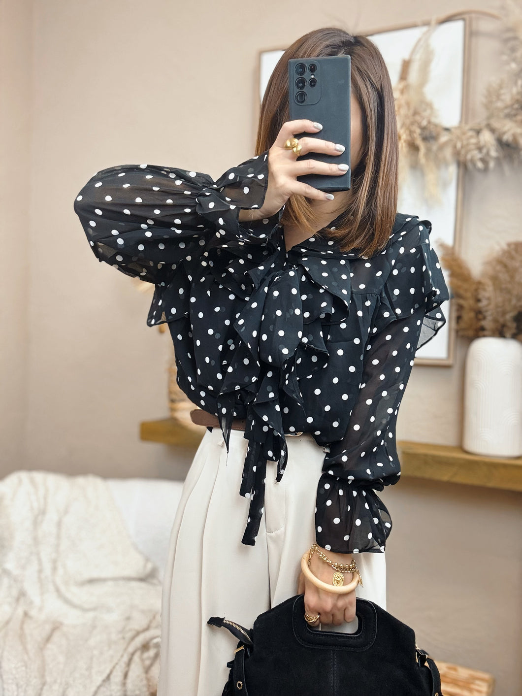 Blouse noire à pois