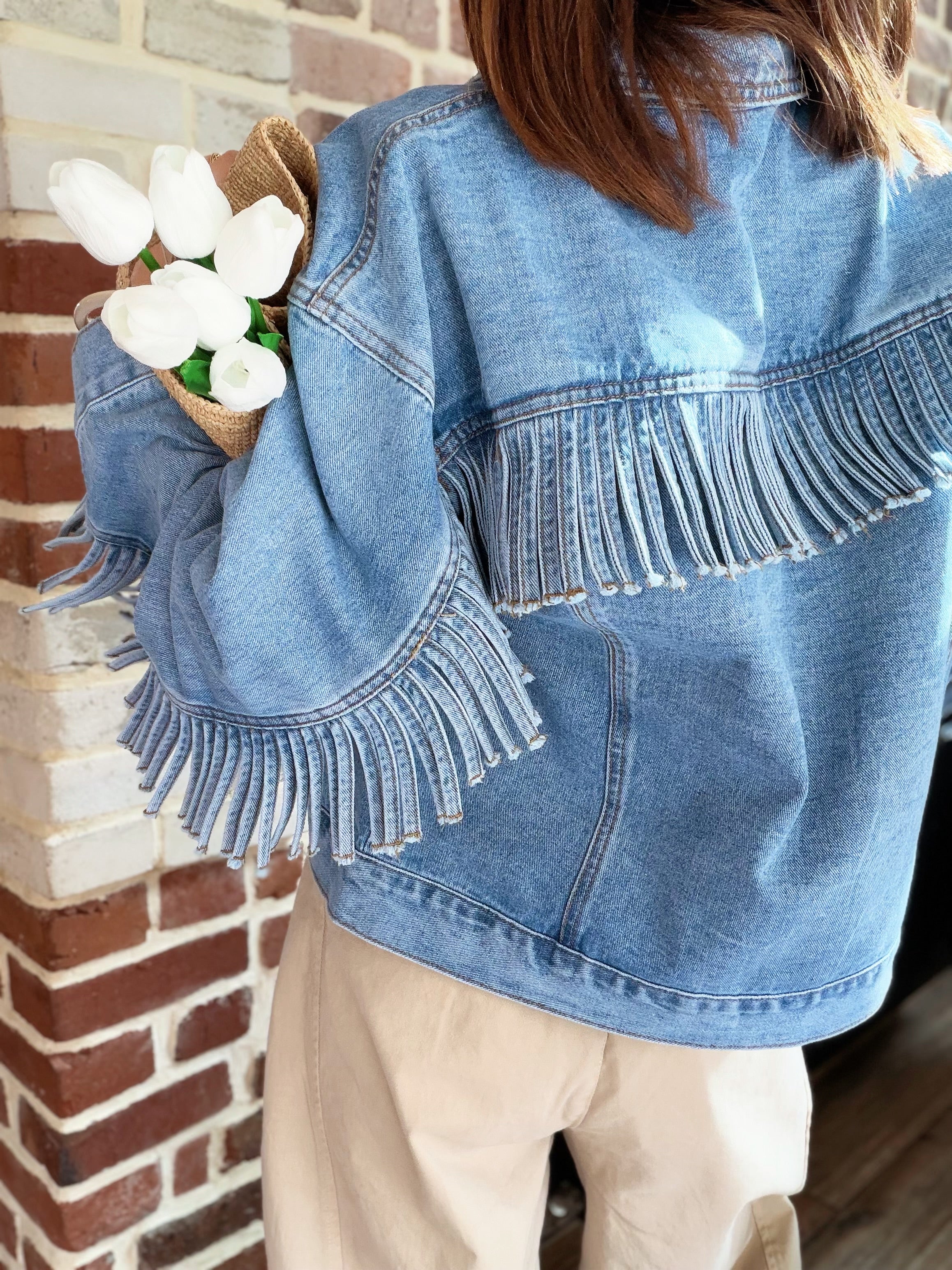 Veste en jean à franges