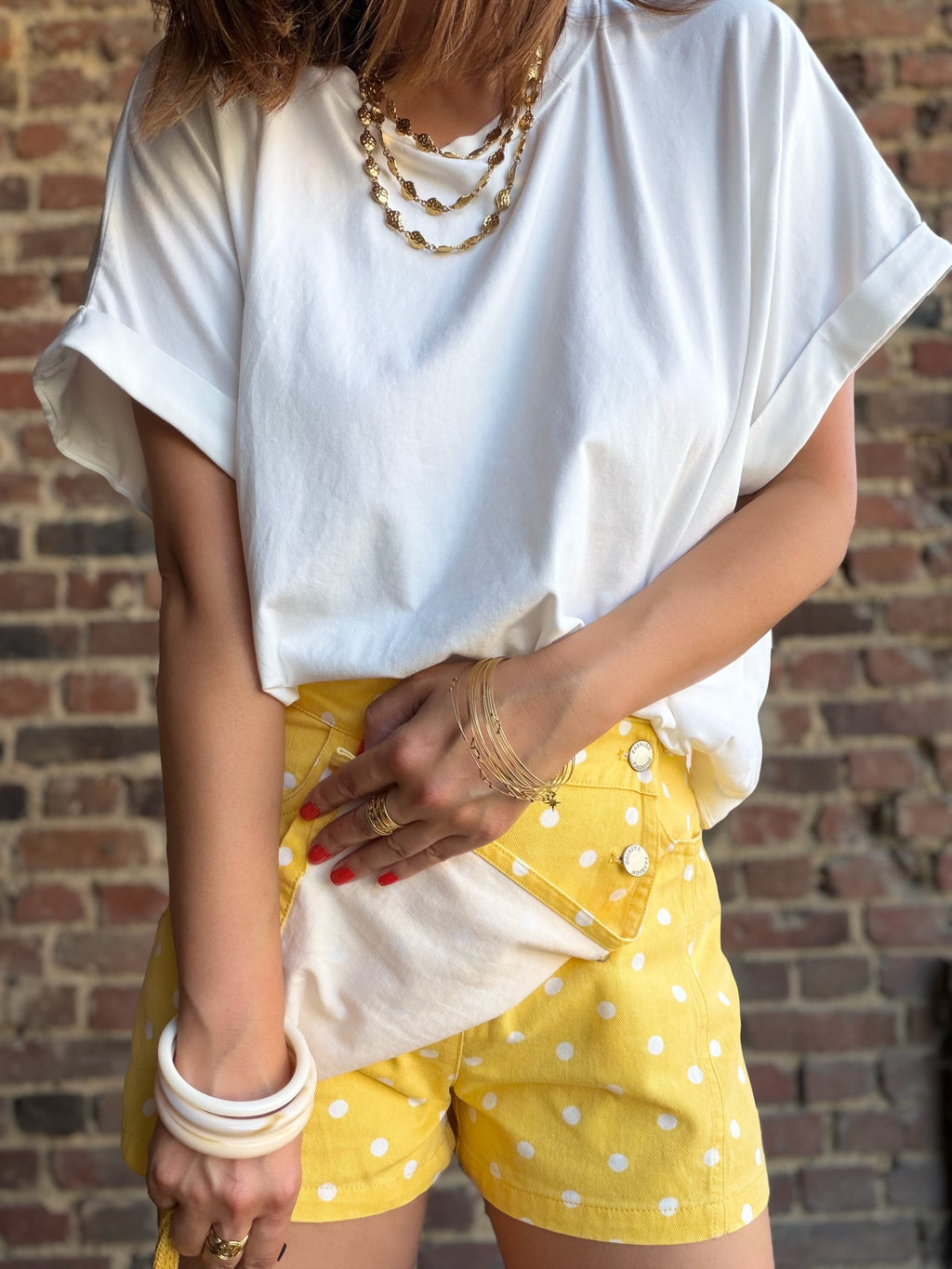 Jupe short jaune à pois