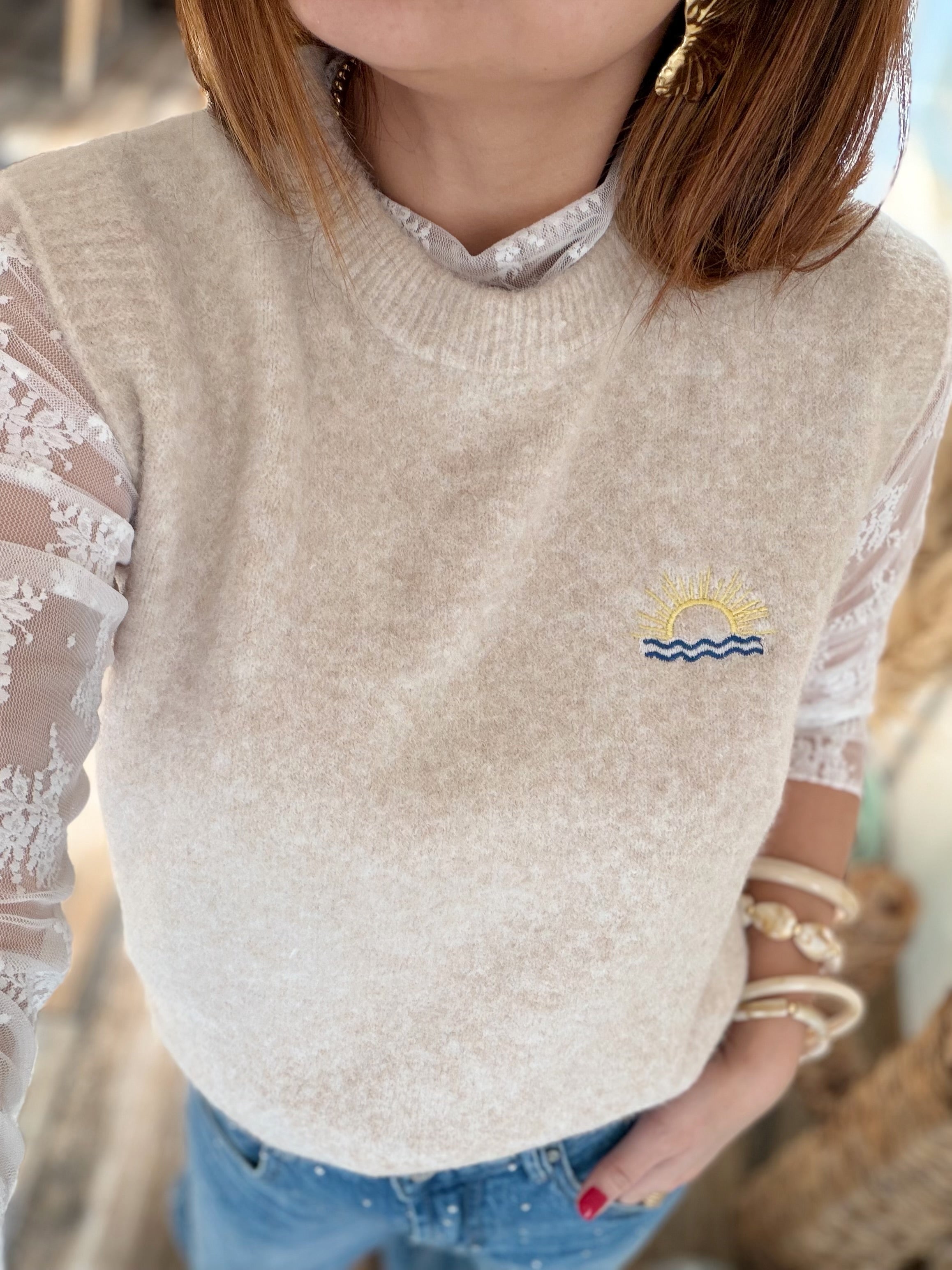 Pull beige sans manches