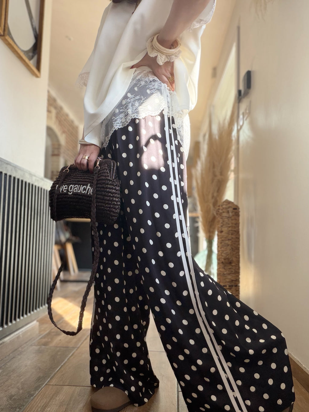 Pantalon noir à pois en soie