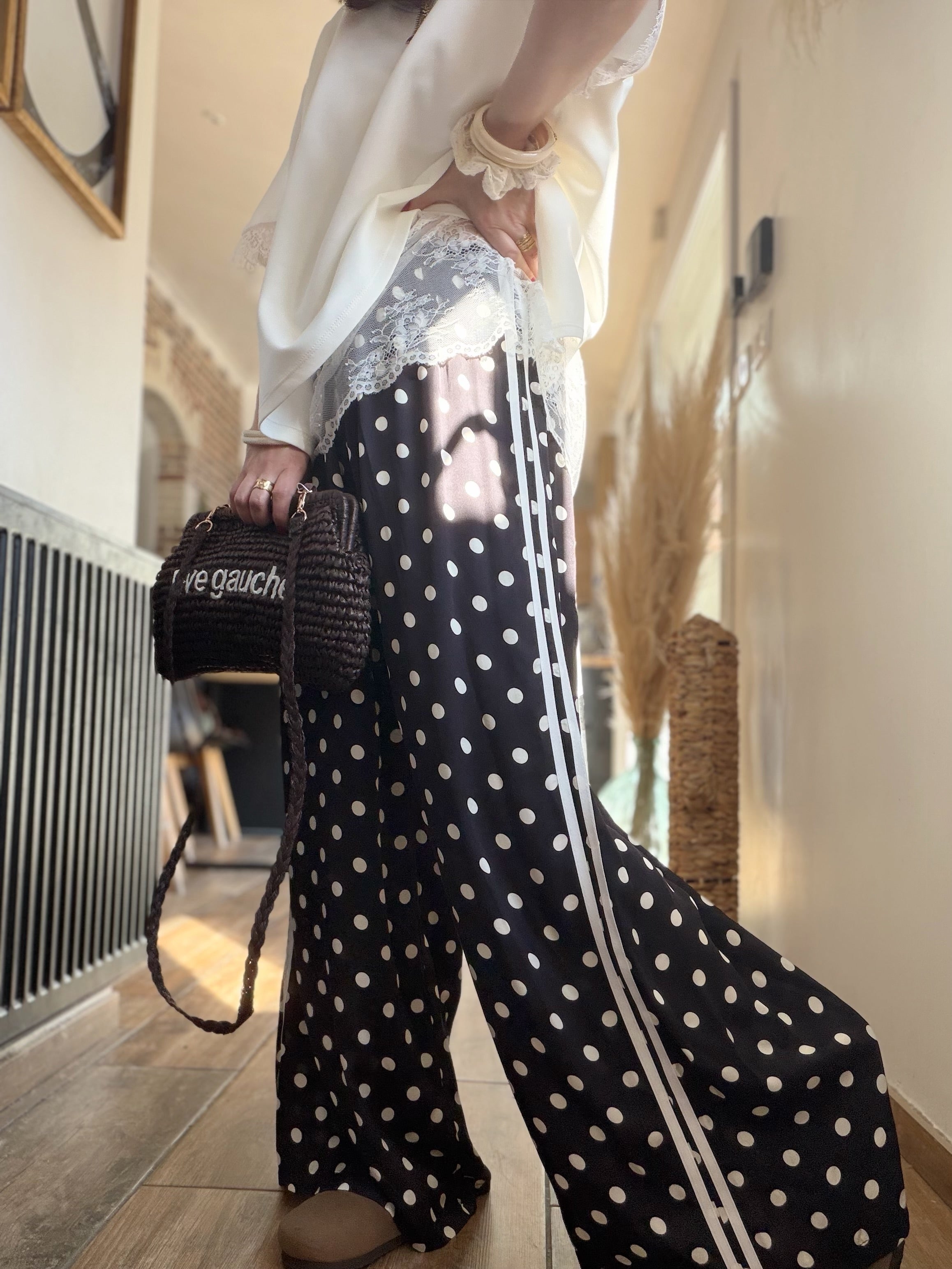 Pantalon noir à pois en soie