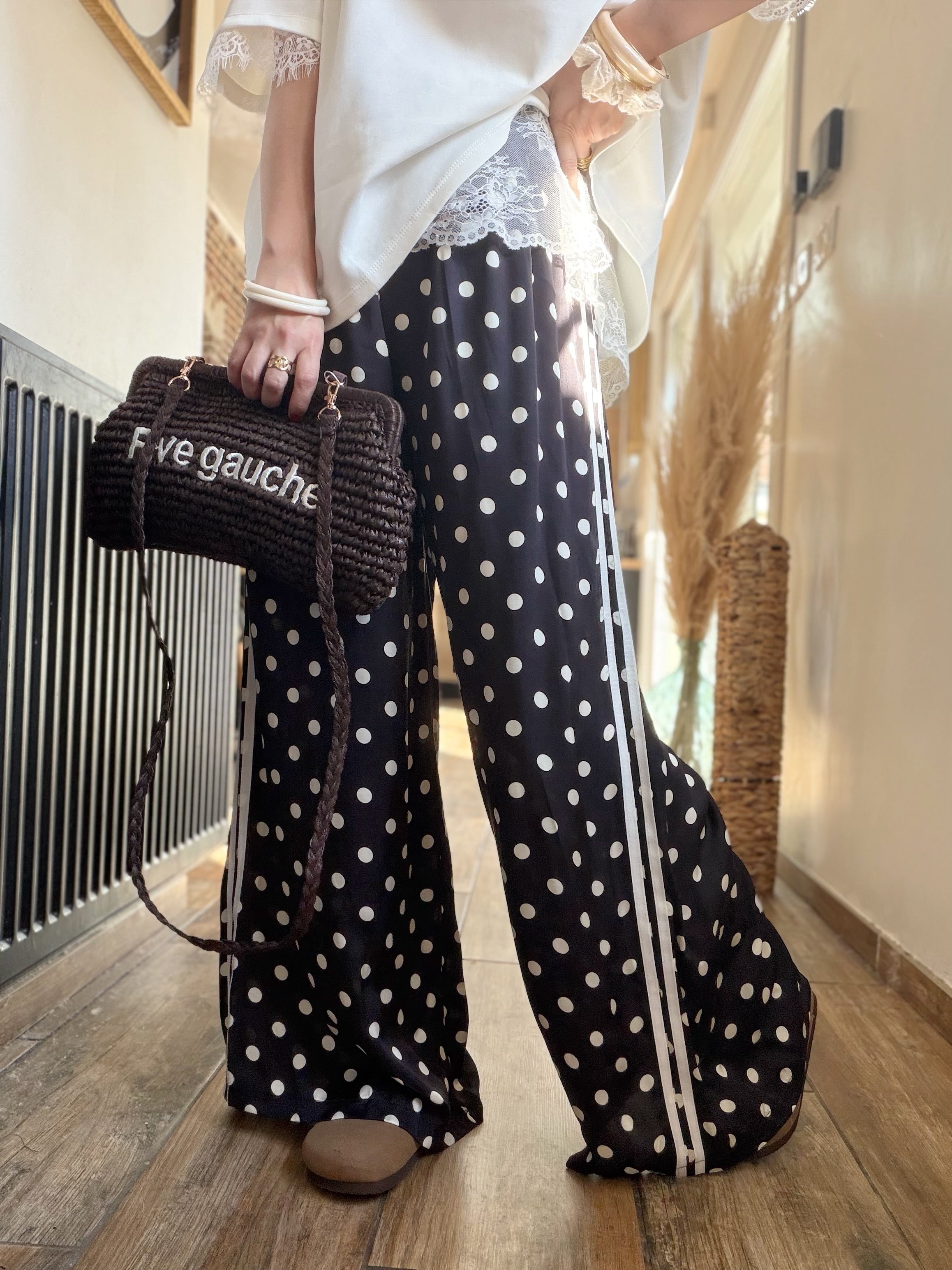 Pantalon noir à pois en soie
