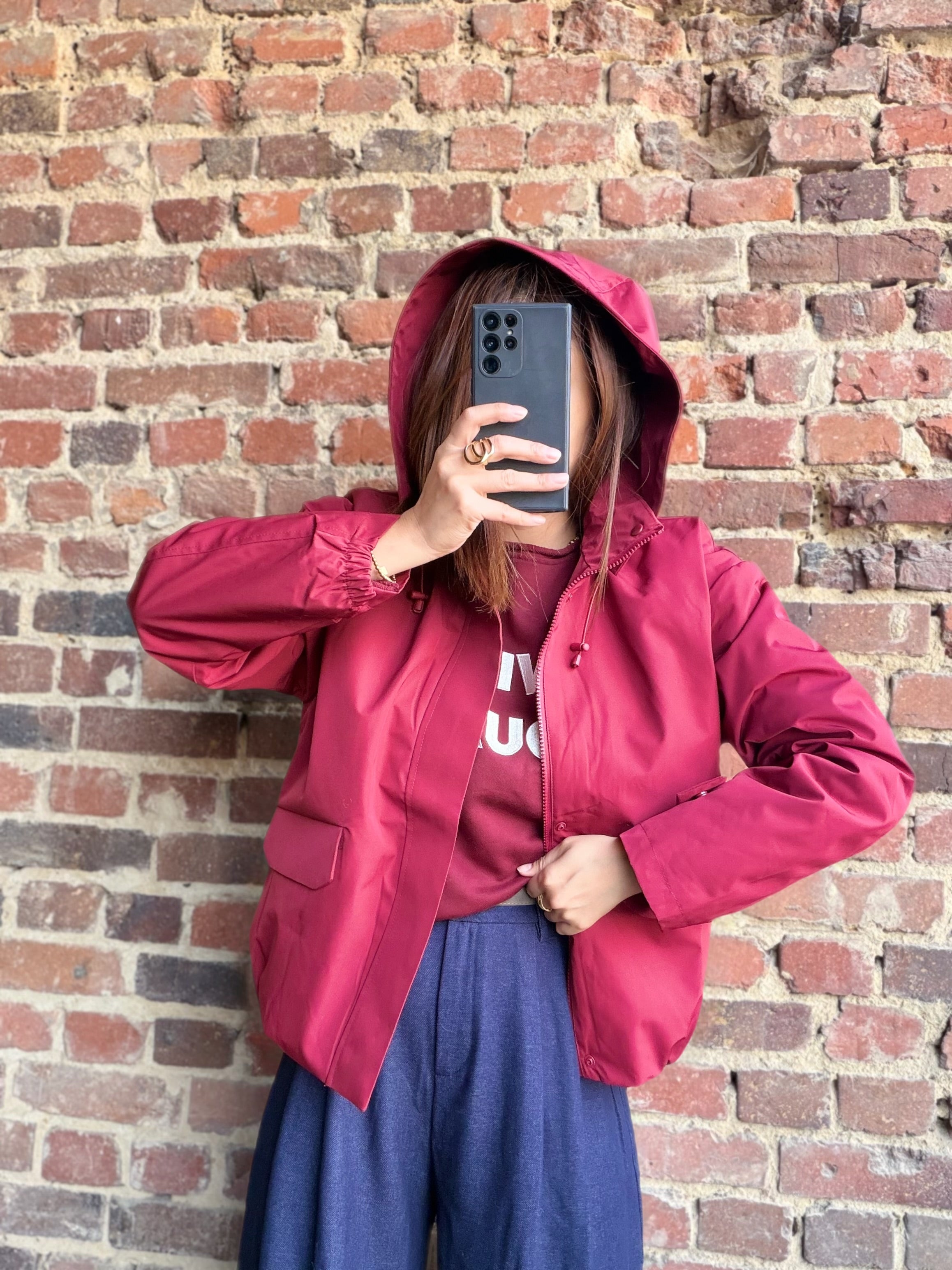 Blouson imperméable rouge bordeaux