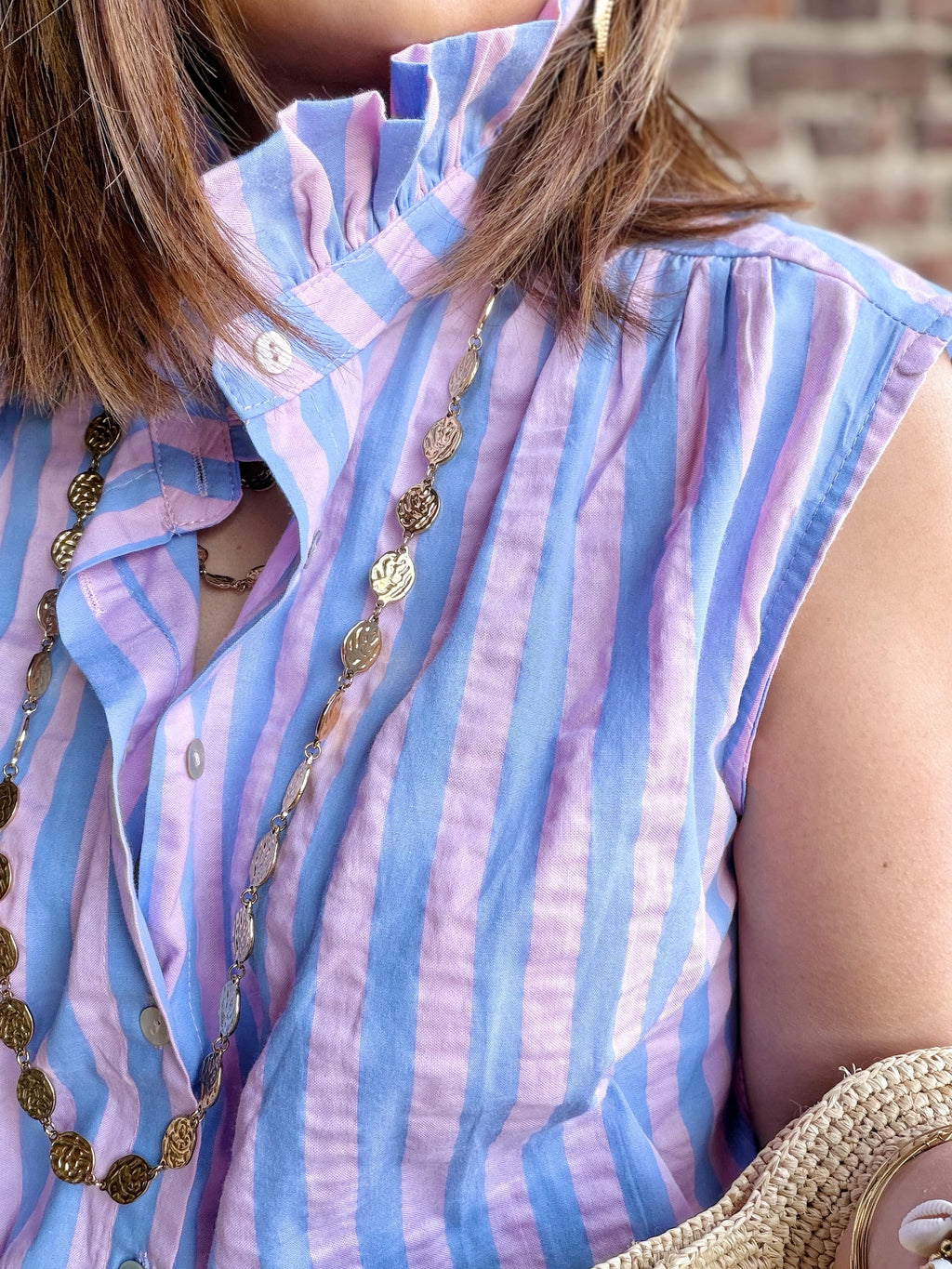 Chemise à rayures sans manches rose et Lila