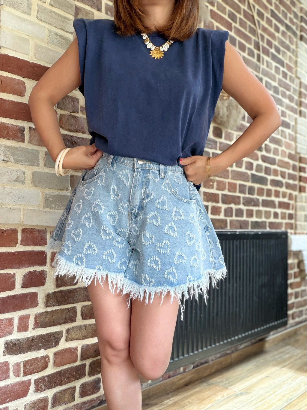 T-shirt bleu delavé épaulettes