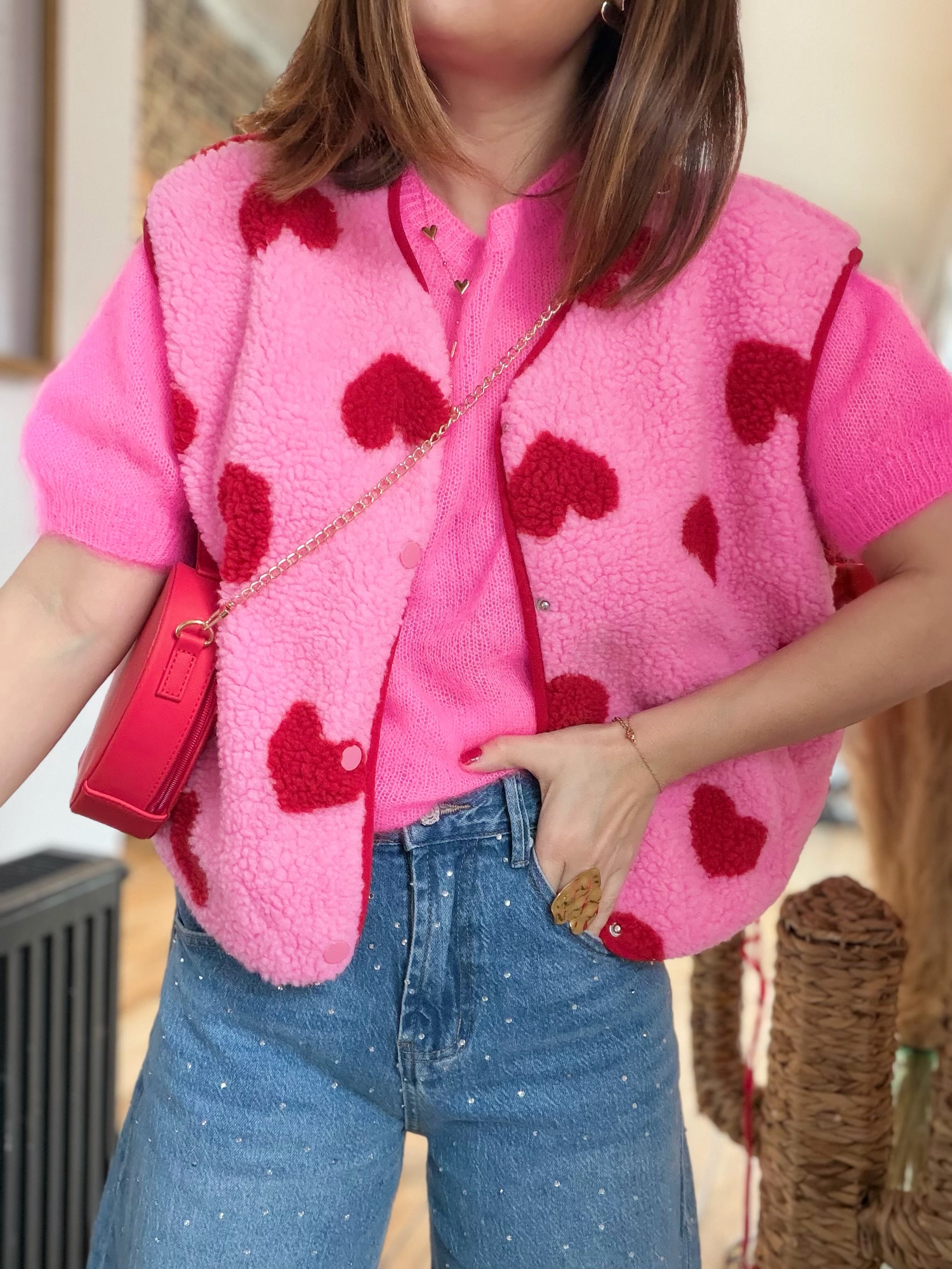 Veste moumoute rose sans manches