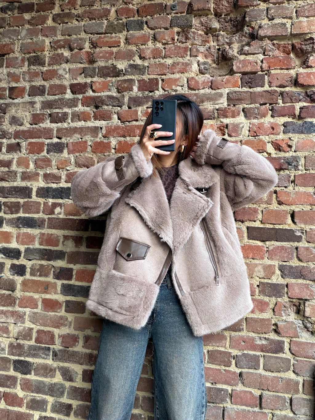 Manteau avec détails en fourrure