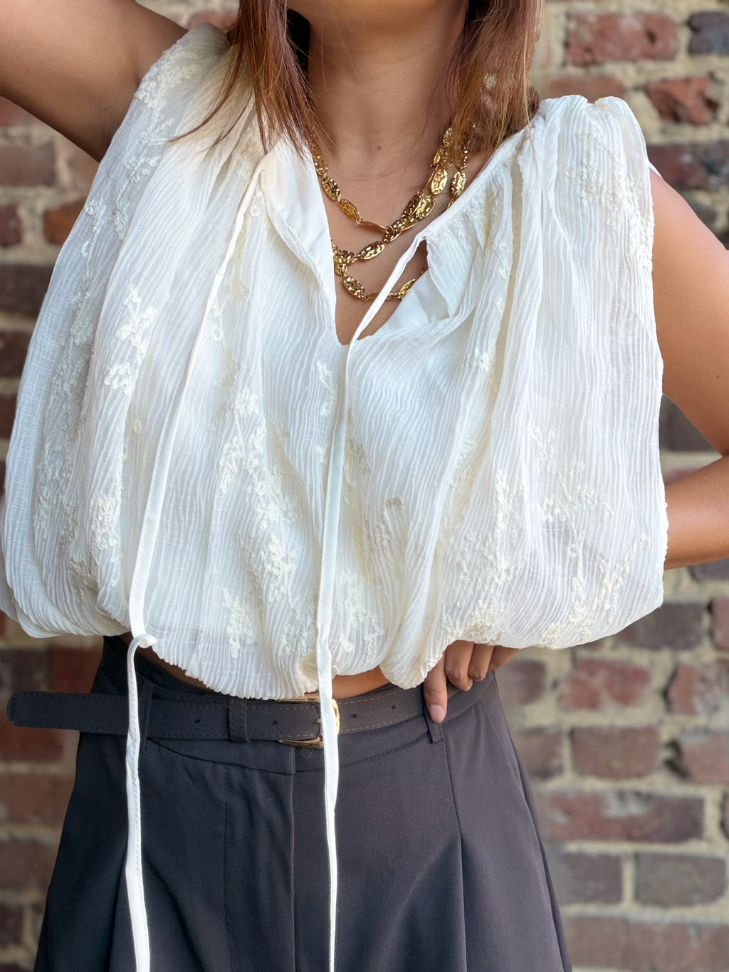 Top beige à fleurs