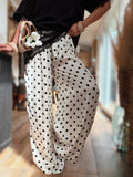 Pantalon à pois en soie