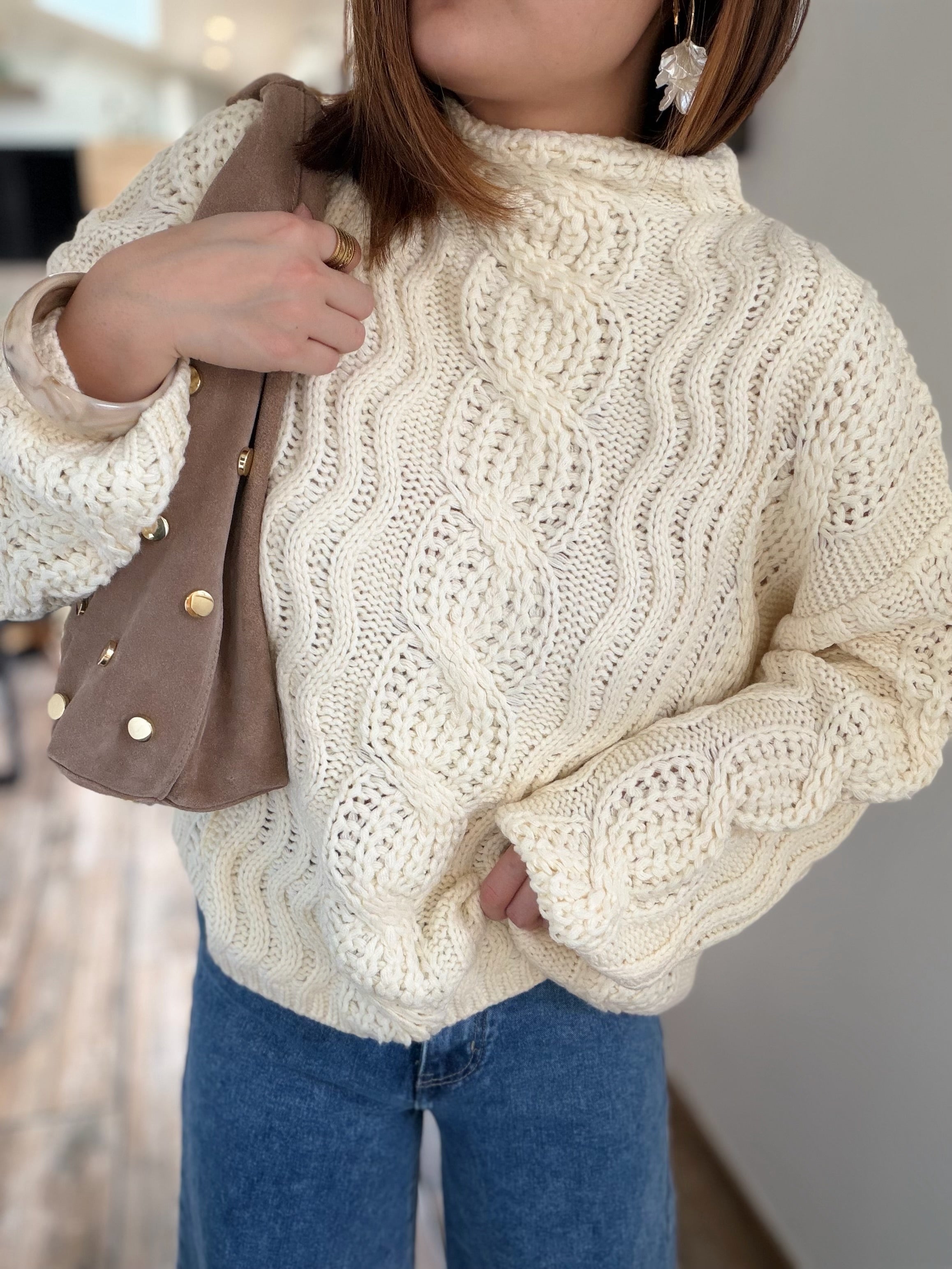 Pull torsadé écru