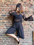 Blouse transparente noire à sequins