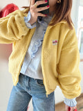 Veste polaire jaune
