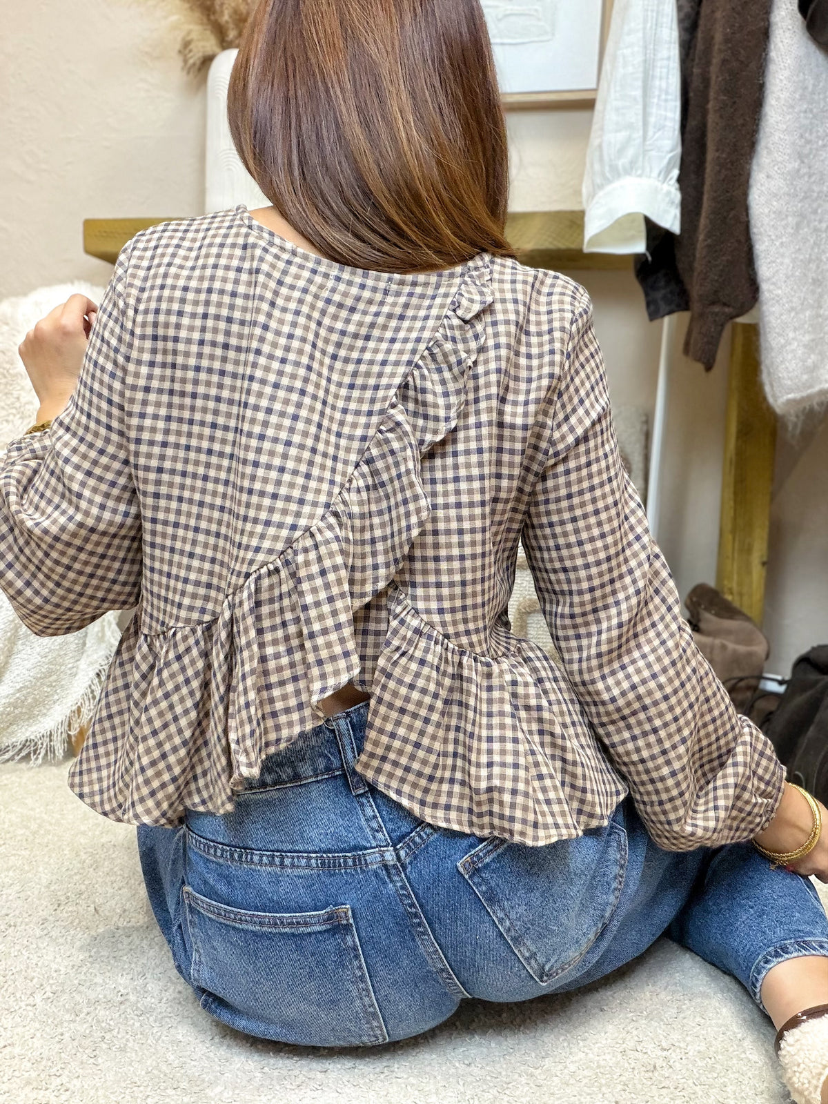 Blouse à carreaux avec ouverture dans le dos